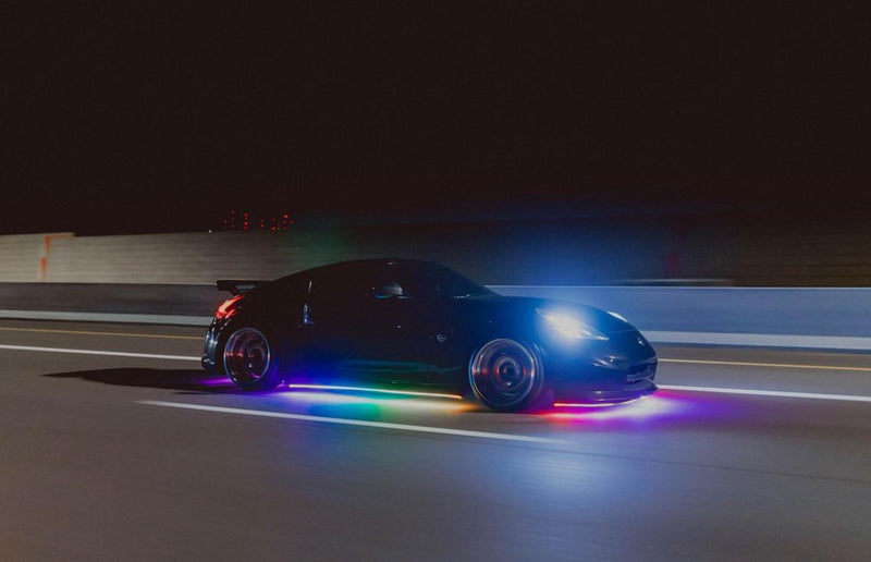 Under Glow LED Strip Kit RGB+W on a black car